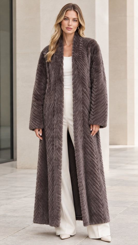 Full front view of model wearing charcoal grey chevron textured faux fur maxi coat