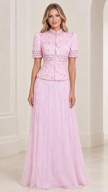Front view of woman wearing Light Pink embroidered high neck evening gown