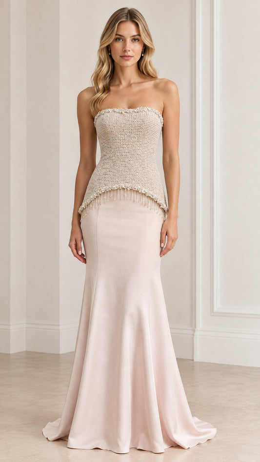 Front full-length view of model wearing Champagne strapless tweed corset evening gown with beaded fringe