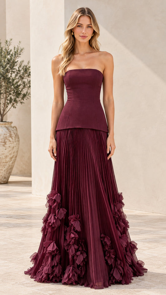 Burgundy strapless corset pleated maxi evening gown with 3D floral appliqued hem front view