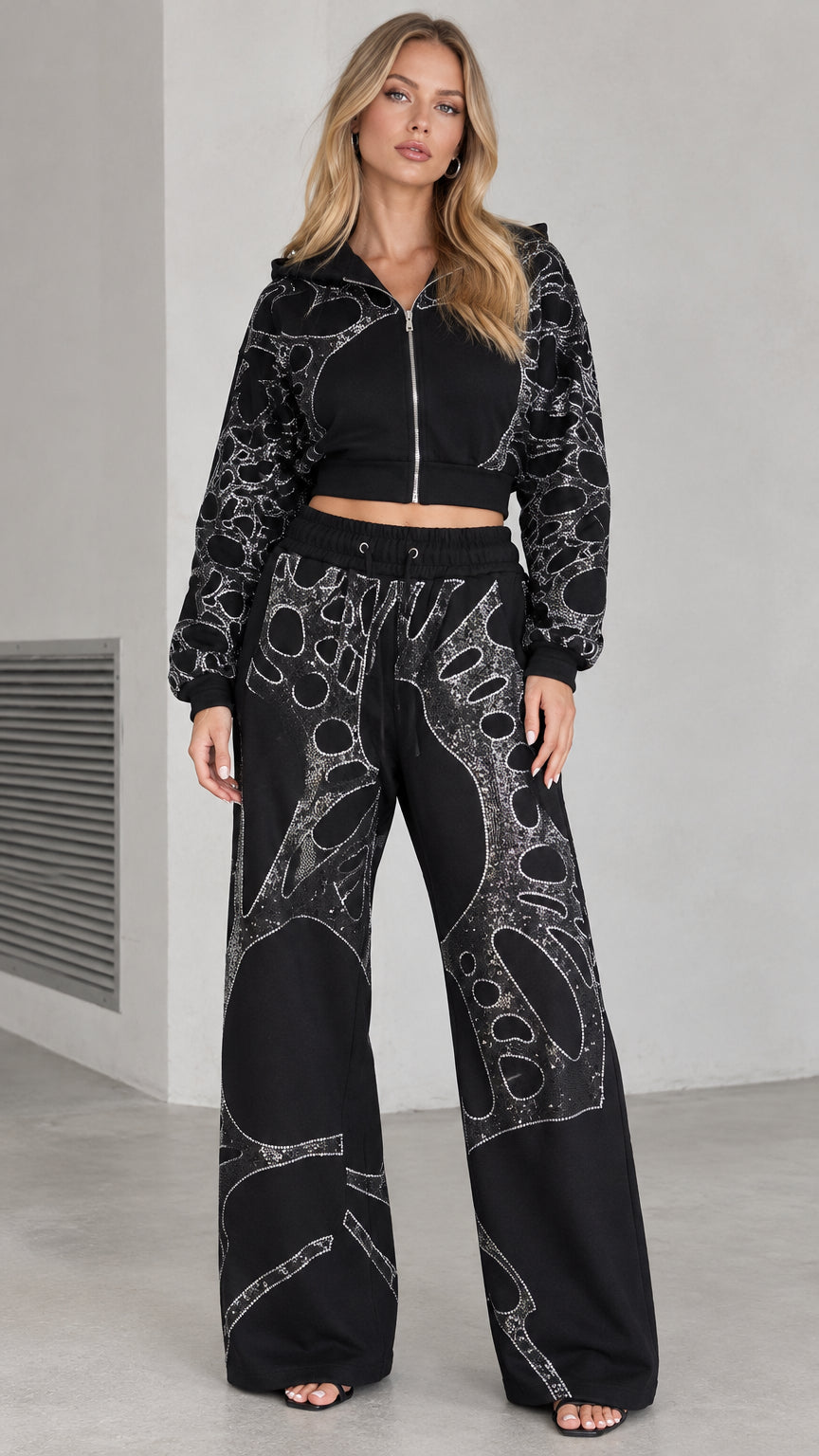 Front full view of woman wearing black rhinestone cropped hoodie and wide leg pants set