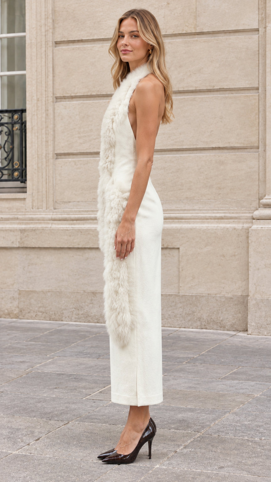 Side profile view of Ivory backless halter column midi dress