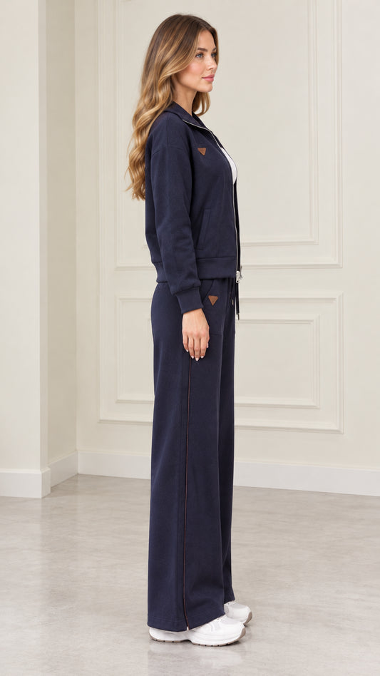 Side profile view of model in Navy Blue loungewear set showing wide-leg trouser fit