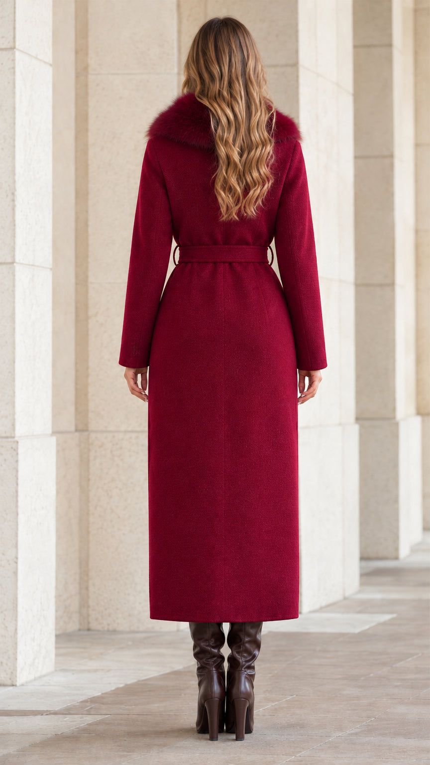 Back view of woman wearing elegant long burgundy coat with tie belt