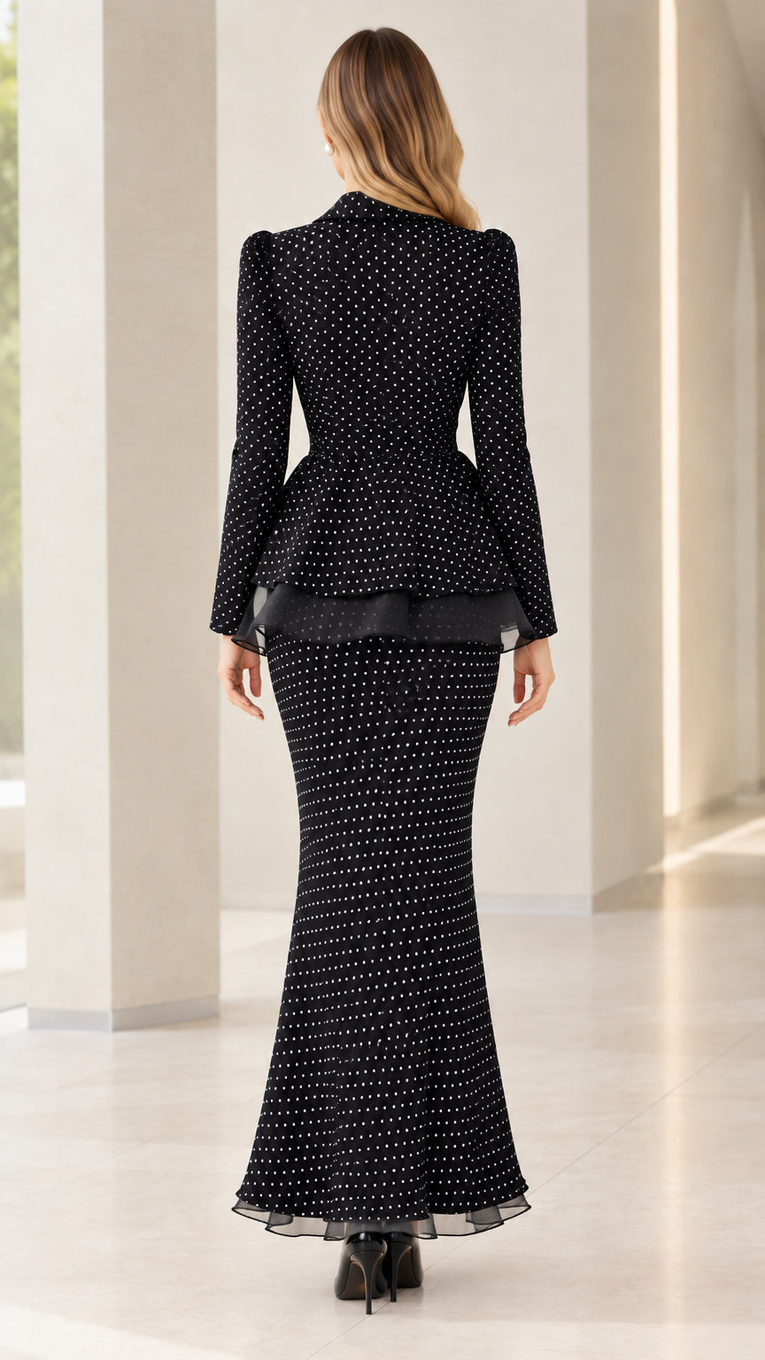 Back view of black polka dot jacket and mermaid maxi skirt