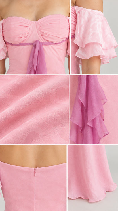 Close-up details of bodice ruching, flutter sleeve, fabric texture, and back zipper on pink gown