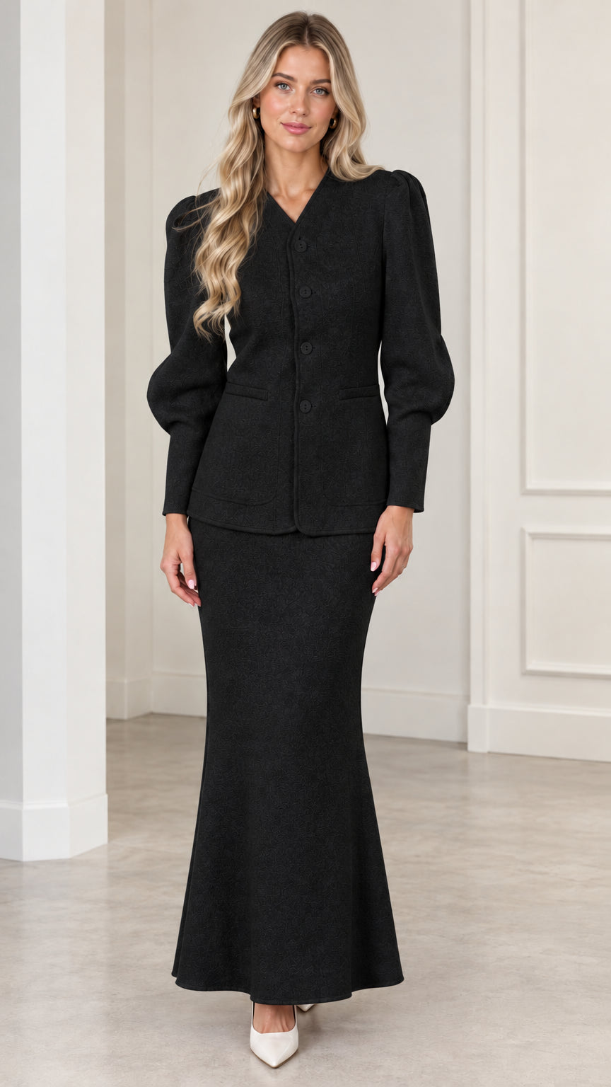 Front view of woman wearing Classic Black puff sleeve jacket and maxi skirt set