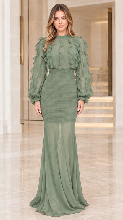 Model wearing Sage Green long sleeve ruffled smocked mermaid gown