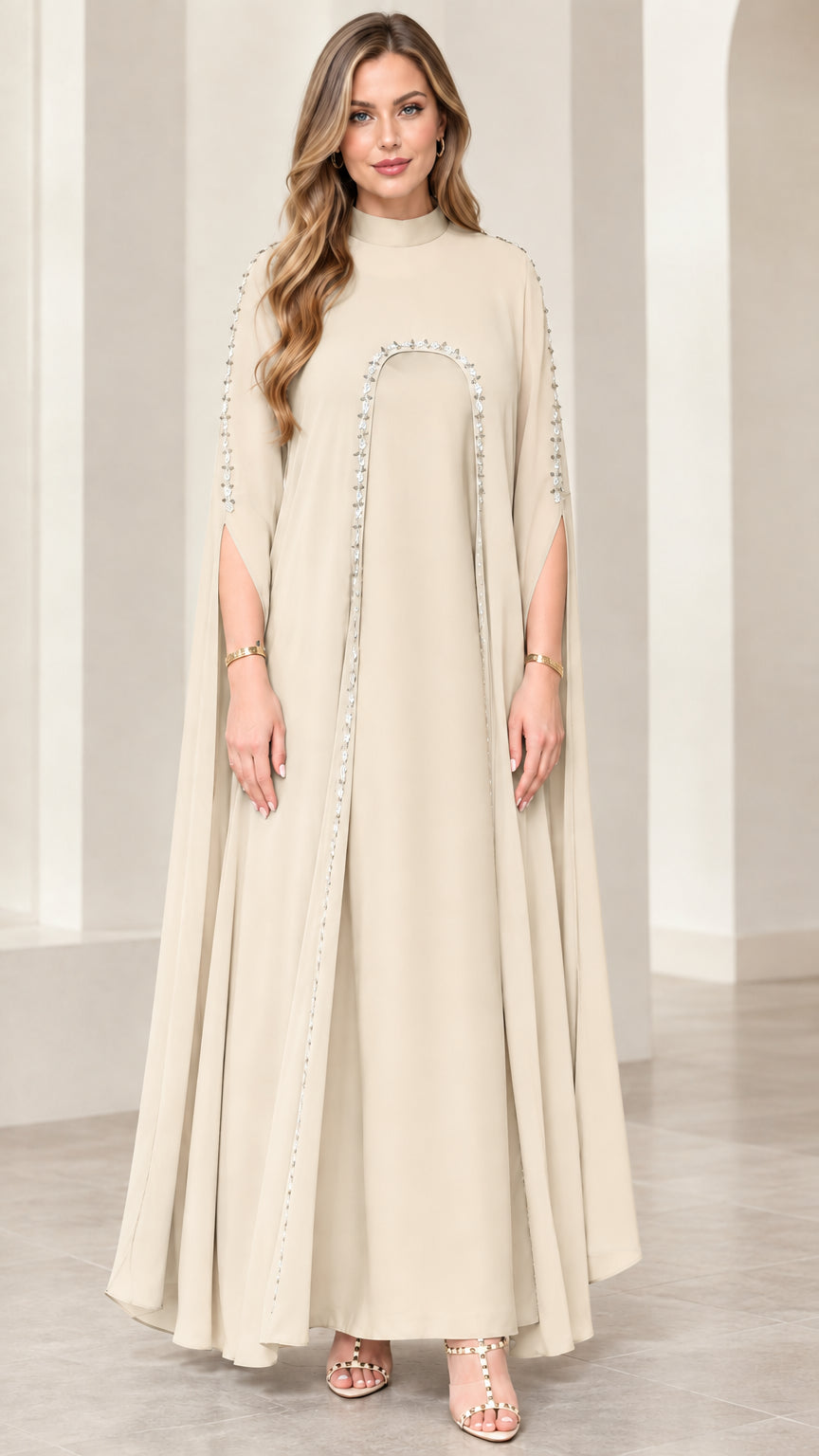 Full front view of champagne beige modest formal gown with beaded cape sleeves