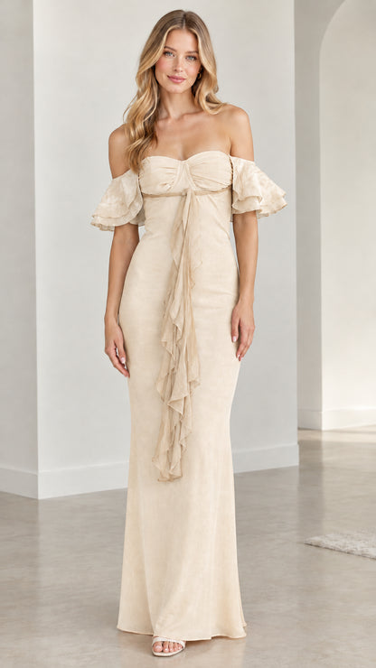 Front view of model wearing champagne cream off-the-shoulder formal gown
